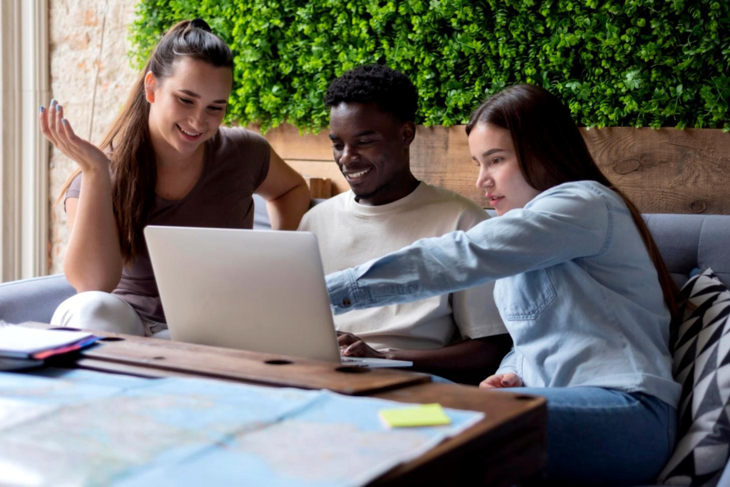 International students reviewing financial documents together